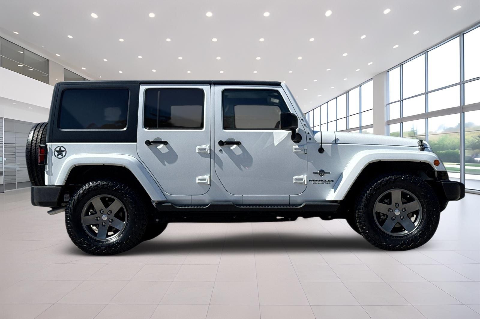 2013 Jeep Wrangler — rear three-quarter view