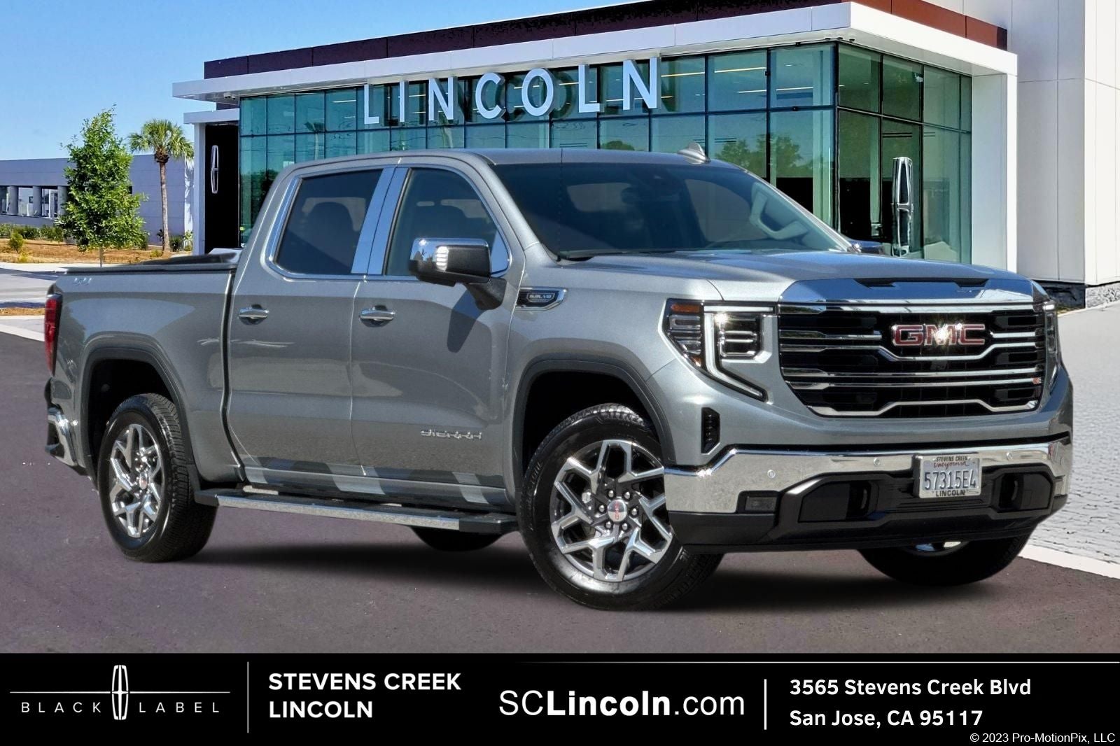 2025 GMC Sierra 1500 SLT in Sterling Metallic — front three-quarter view