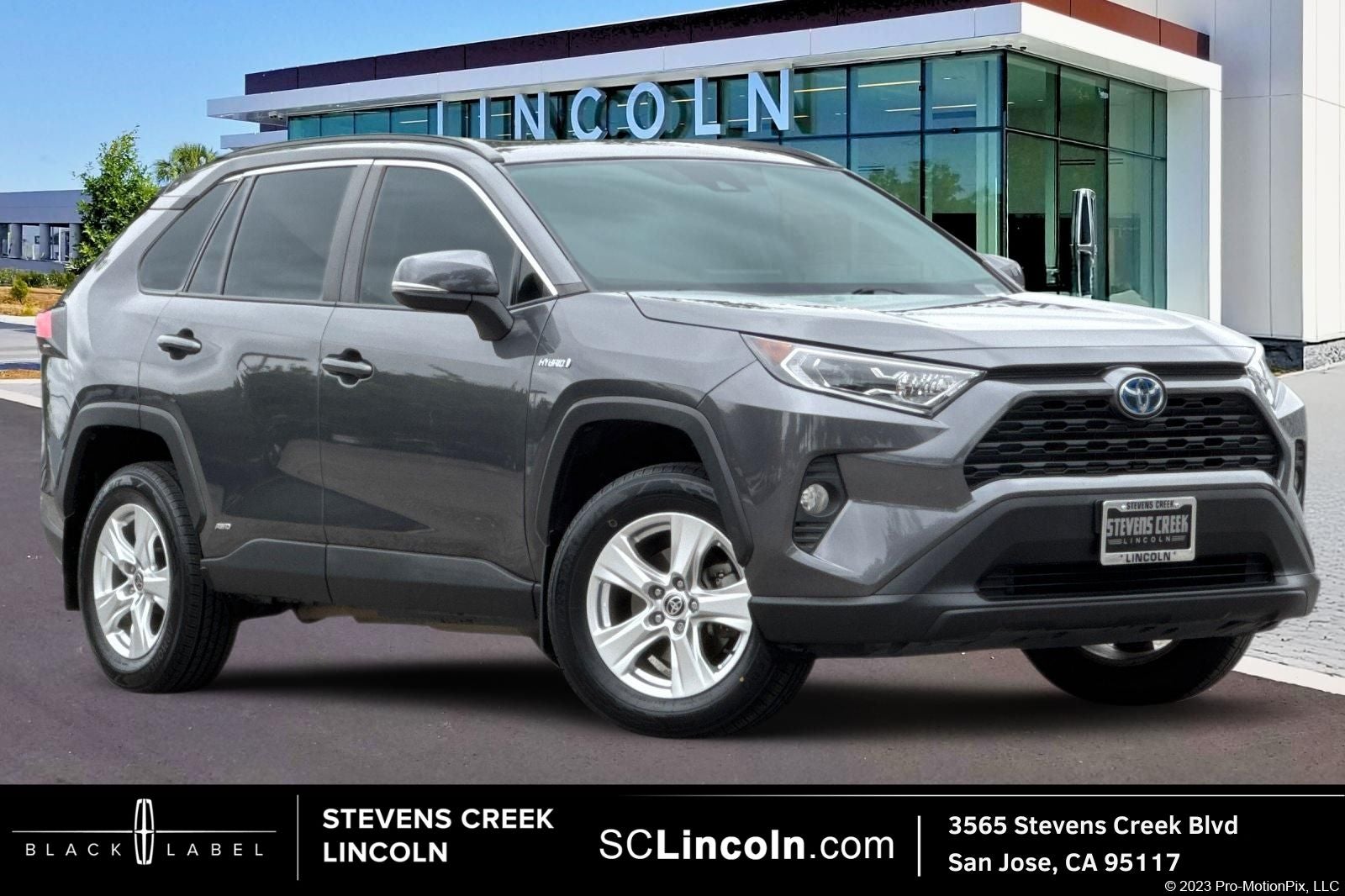 2021 Toyota RAV4 Hybrid XLE in Magnetic Gray Metallic — front three-quarter view