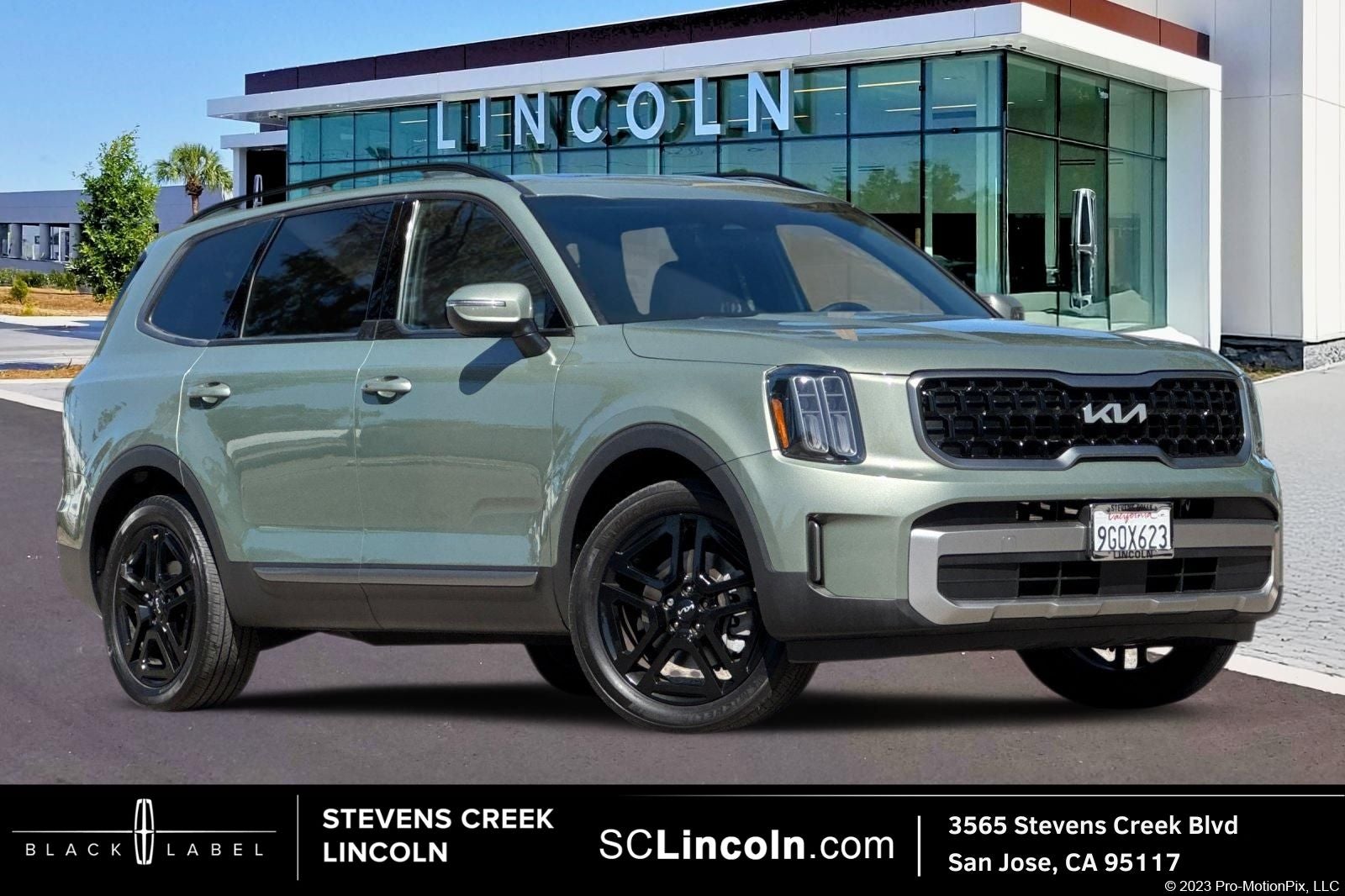 2023 Kia Telluride EX X-Line in Jungle Green — front three-quarter view